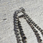 20" Interesting Strand of Graduated Vintage Navajo Pearls Old Pawn Sterling. JN 817